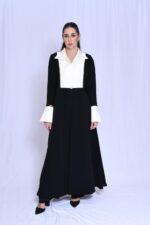 An elegant black blazer featuring white taffeta sleeves and collar. - Image 3
