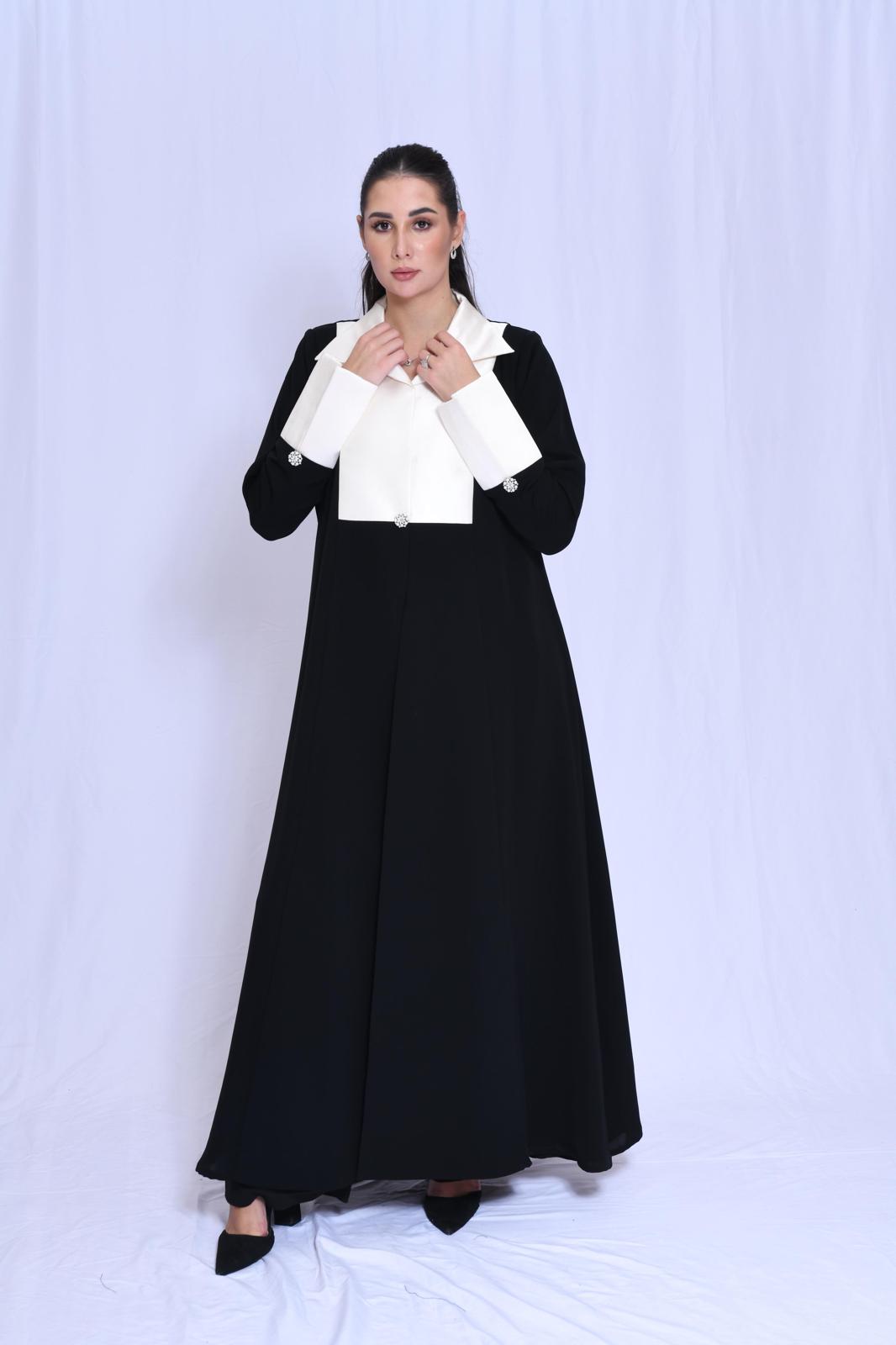WhatsApp Image 2026-07-29 at 5.28.28 PM (2) An elegant black blazer featuring white taffeta sleeves and collar. - Image 1