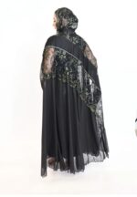 A luxurious black and gold lace abaya featuring shimmering foil chiffon. - Image 3