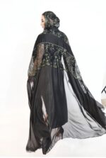 A luxurious black and gold lace abaya featuring shimmering foil chiffon. - Image 4