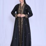 A special-occasion Shantung abaya featuring luxurious embroidery and beadwork for a distinctive look.