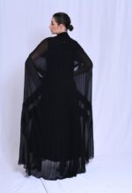 Pleated chiffon with a cape-style cut. - Image 2