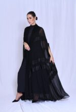 Pleated chiffon with a cape-style cut. - Image 3